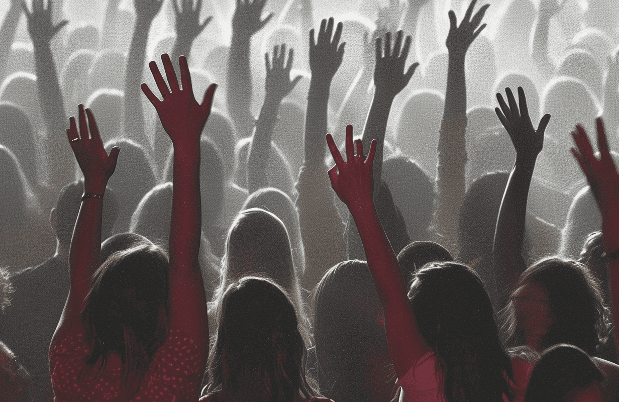 Evangelicals in church raising their hands high for Christian nationalism